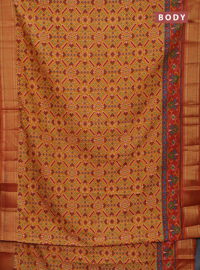 Semi tussar saree mustard yellow and red shade with allover ikat prints and zari woven border