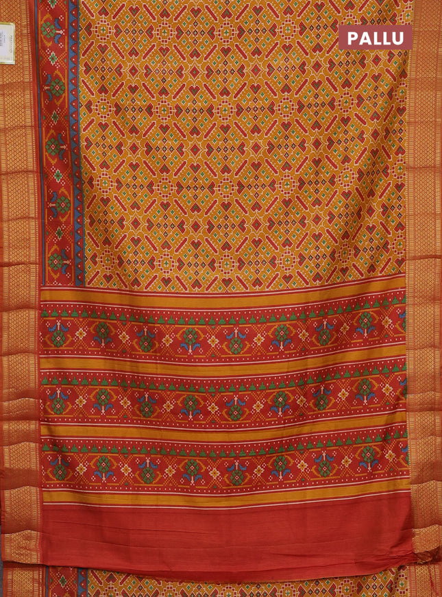 Semi tussar saree mustard yellow and red shade with allover ikat prints and zari woven border