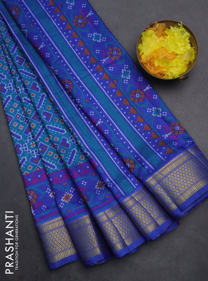 Semi tussar saree dual shade of cs blue and blue with allover ikat prints and zari woven border
