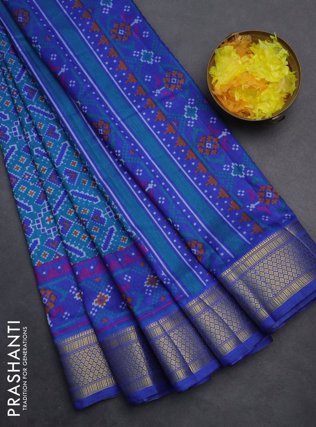 Semi tussar saree dual shade of cs blue and blue with allover ikat prints and zari woven border
