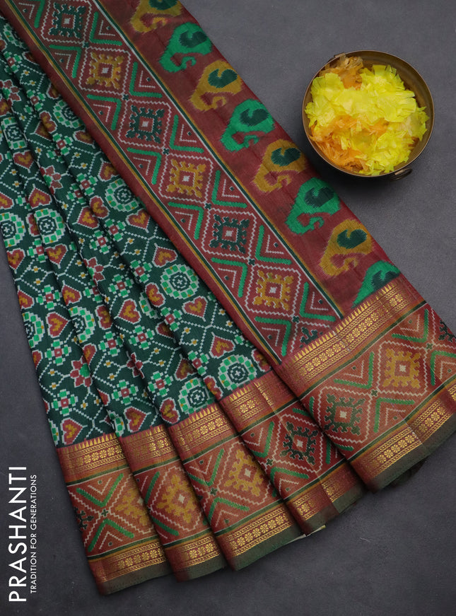 Semi tussar saree green and maroon with allover ikat prints and zari woven border