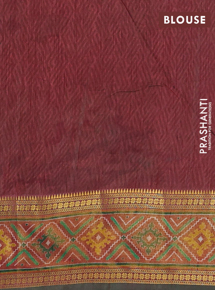 Semi tussar saree green and maroon with allover ikat prints and zari woven border