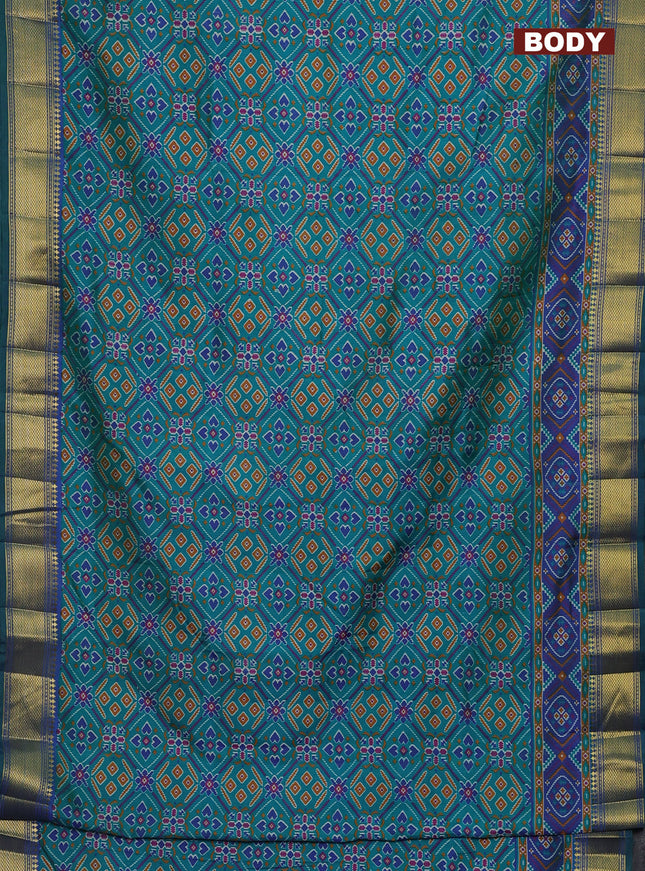 Semi tussar saree teal green and blue with allover ikat prints and zari woven border