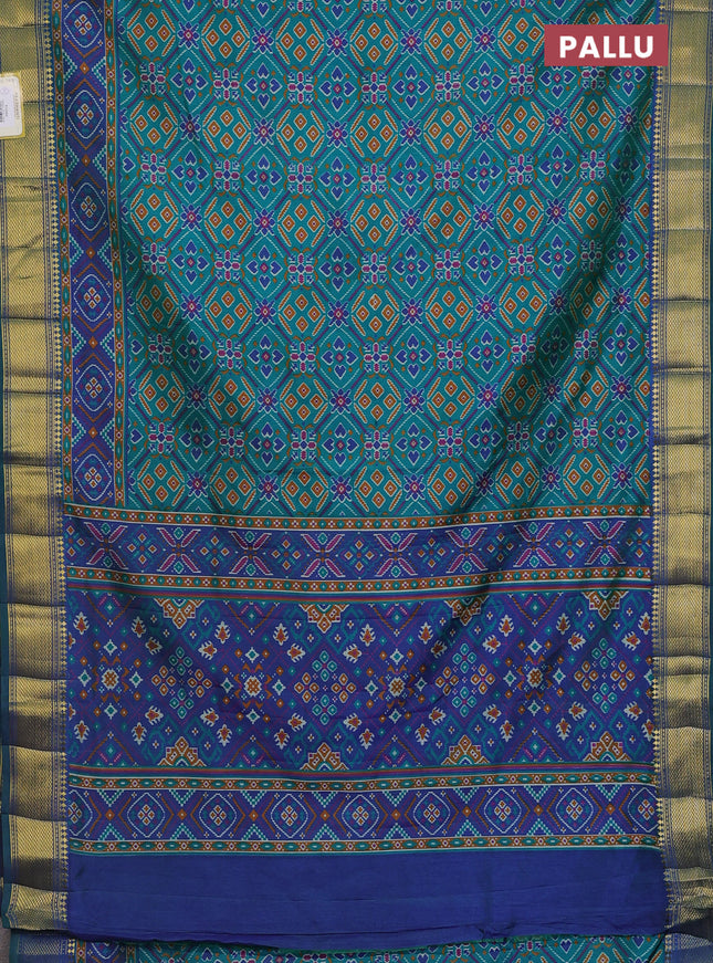 Semi tussar saree teal green and blue with allover ikat prints and zari woven border
