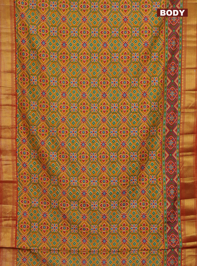 Semi tussar saree mustard yellow and red with allover ikat prints and zari woven border