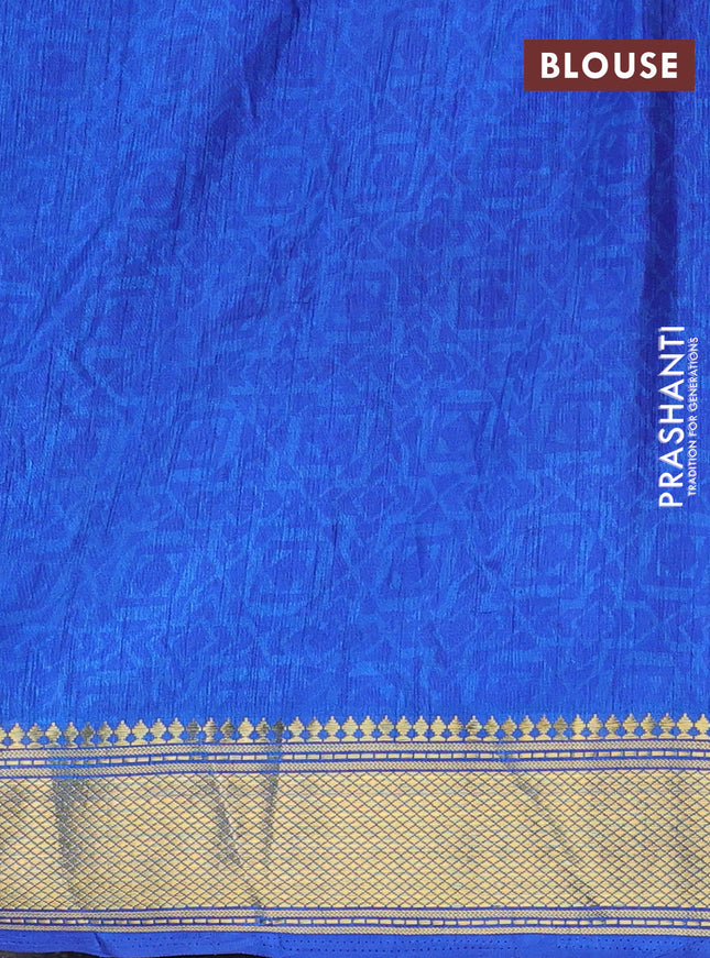 Semi tussar saree blue with allover ikat prints and zari woven border