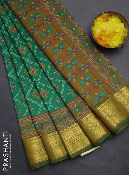 Semi tussar saree green with allover ikat prints and zari woven border