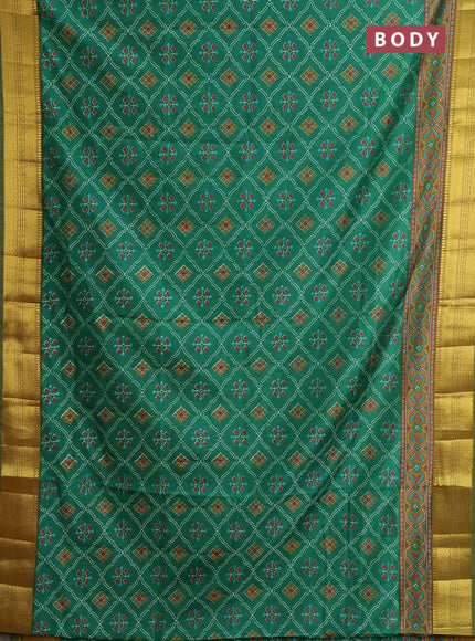 Semi tussar saree green with allover ikat prints and zari woven border