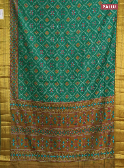 Semi tussar saree green with allover ikat prints and zari woven border
