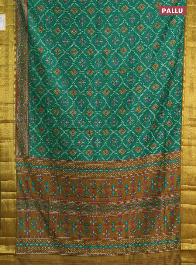 Semi tussar saree green with allover ikat prints and zari woven border
