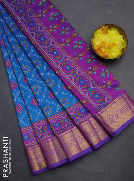 Semi tussar saree cs blue and purple with allover ikat prints and zari woven border