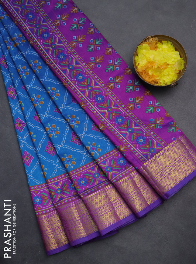 Semi tussar saree cs blue and purple with allover ikat prints and zari woven border