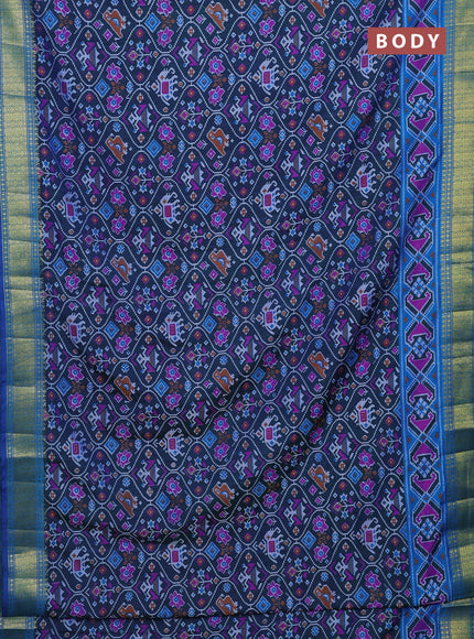 Semi tussar saree dual shade of bluish green and blue with allover ikat prints and zari woven border