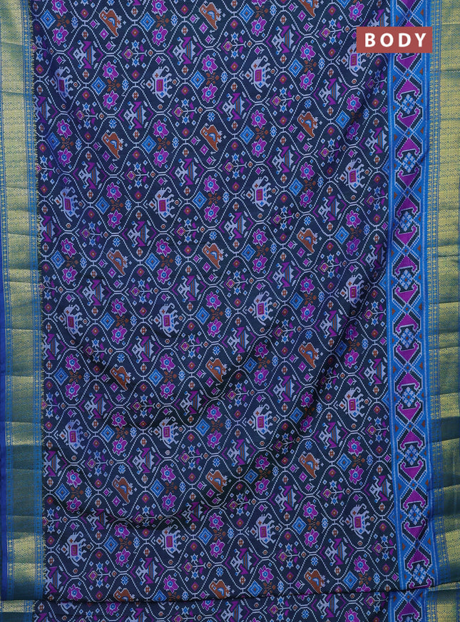 Semi tussar saree dual shade of bluish green and blue with allover ikat prints and zari woven border