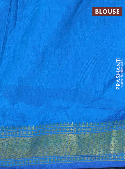 Semi tussar saree dual shade of bluish green and blue with allover ikat prints and zari woven border