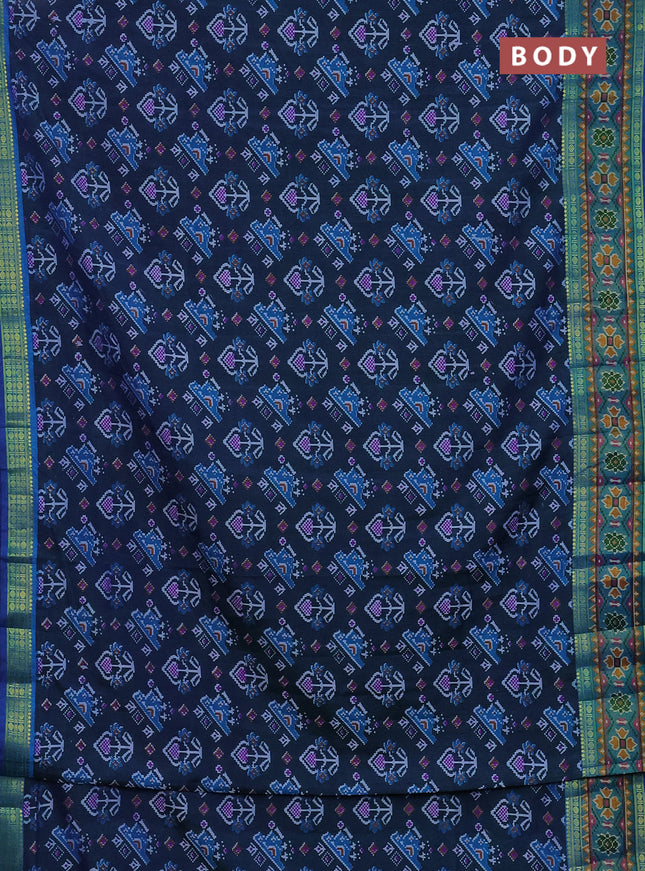 Semi tussar saree dual shade of bluish green and blue with allover ikat prints and zari woven border