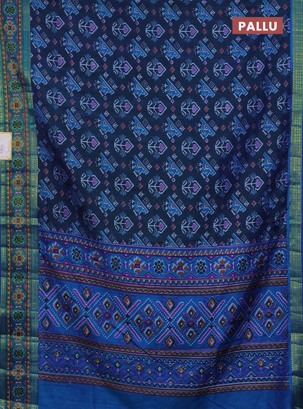 Semi tussar saree dual shade of bluish green and blue with allover ikat prints and zari woven border