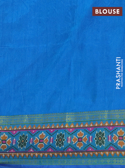 Semi tussar saree dual shade of bluish green and blue with allover ikat prints and zari woven border