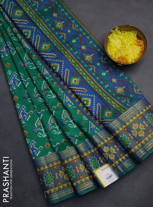 Semi tussar saree green and blue with allover ikat prints and zari woven border