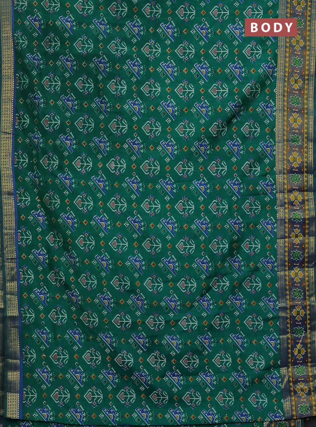 Semi tussar saree green and blue with allover ikat prints and zari woven border