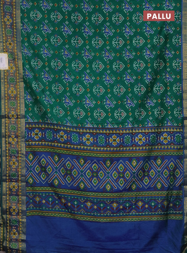 Semi tussar saree green and blue with allover ikat prints and zari woven border