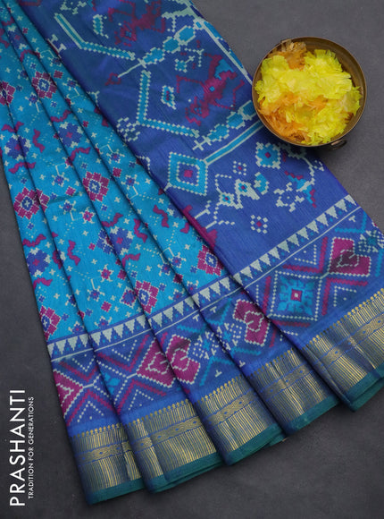 Semi tussar saree cs blue and blue with allover ikat prints and zari woven border