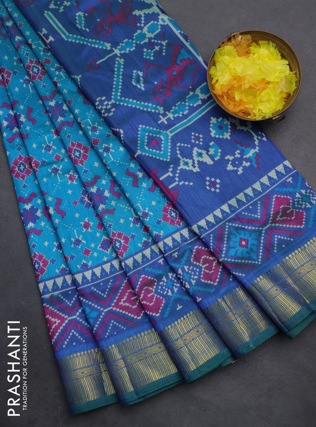 Semi tussar saree cs blue and blue with allover ikat prints and zari woven border
