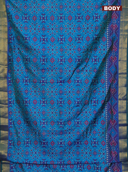Semi tussar saree cs blue and blue with allover ikat prints and zari woven border