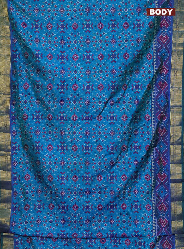 Semi tussar saree cs blue and blue with allover ikat prints and zari woven border