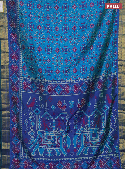 Semi tussar saree cs blue and blue with allover ikat prints and zari woven border