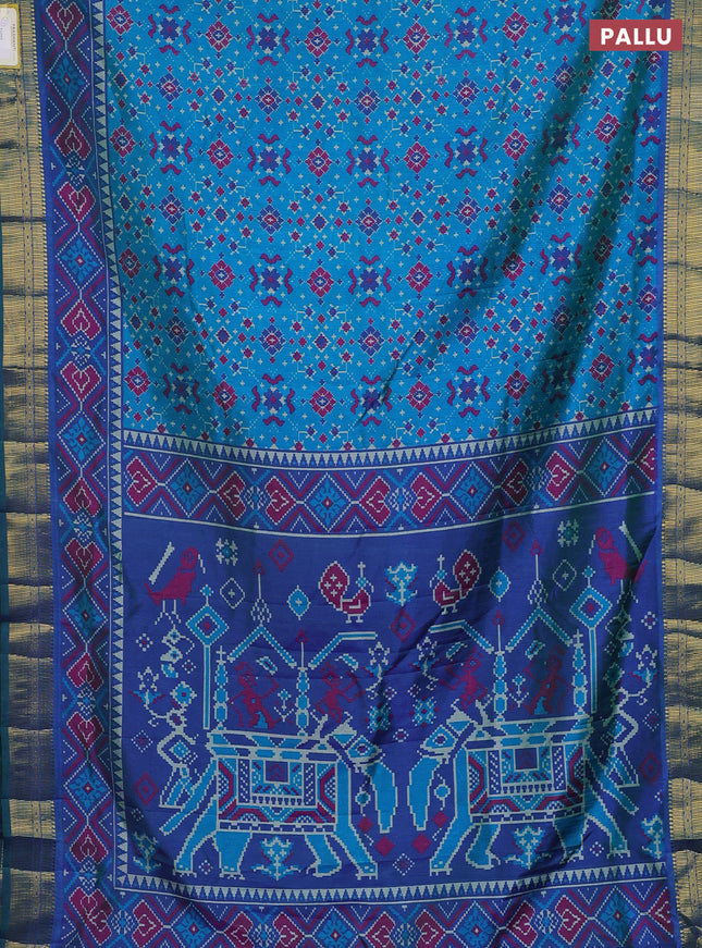 Semi tussar saree cs blue and blue with allover ikat prints and zari woven border