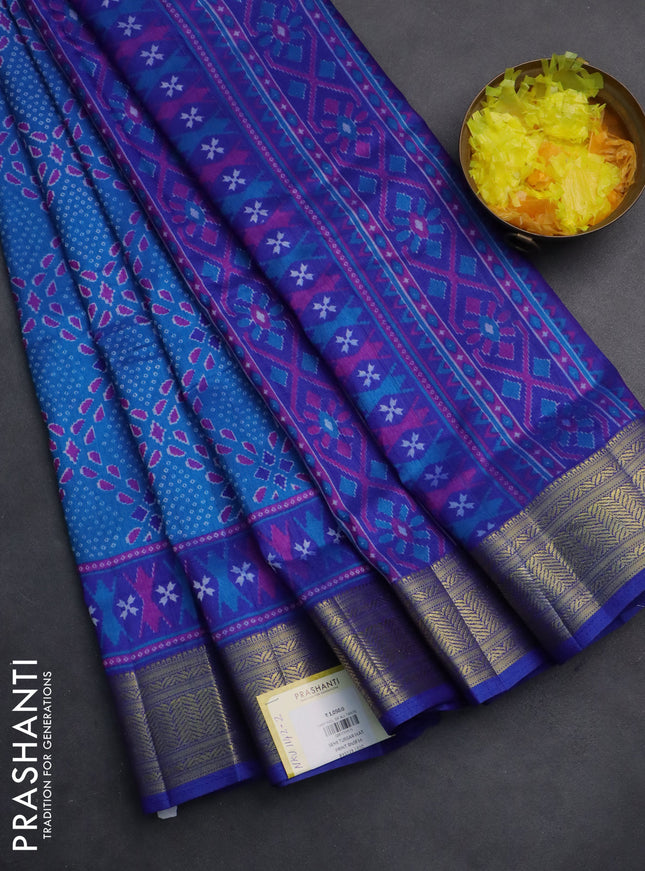 Semi tussar saree cs blue and blue with allover ikat prints and zari woven border