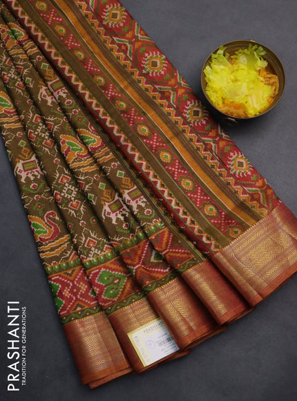Semi tussar saree dual shade of green and blue with allover ikat prints and zari woven border