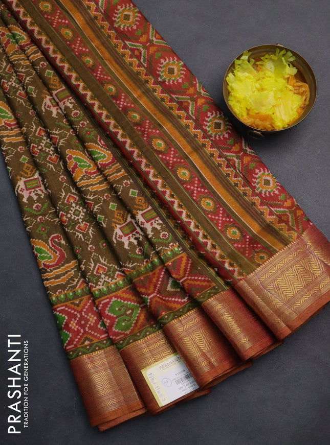 Semi tussar saree dual shade of green and blue with allover ikat prints and zari woven border