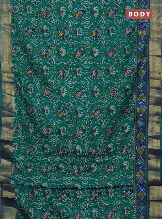 Semi tussar saree teal green and blue with allover ikat prints and zari woven border