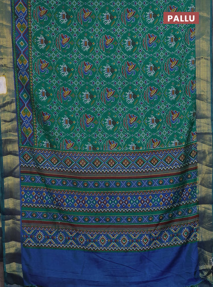 Semi tussar saree teal green and blue with allover ikat prints and zari woven border