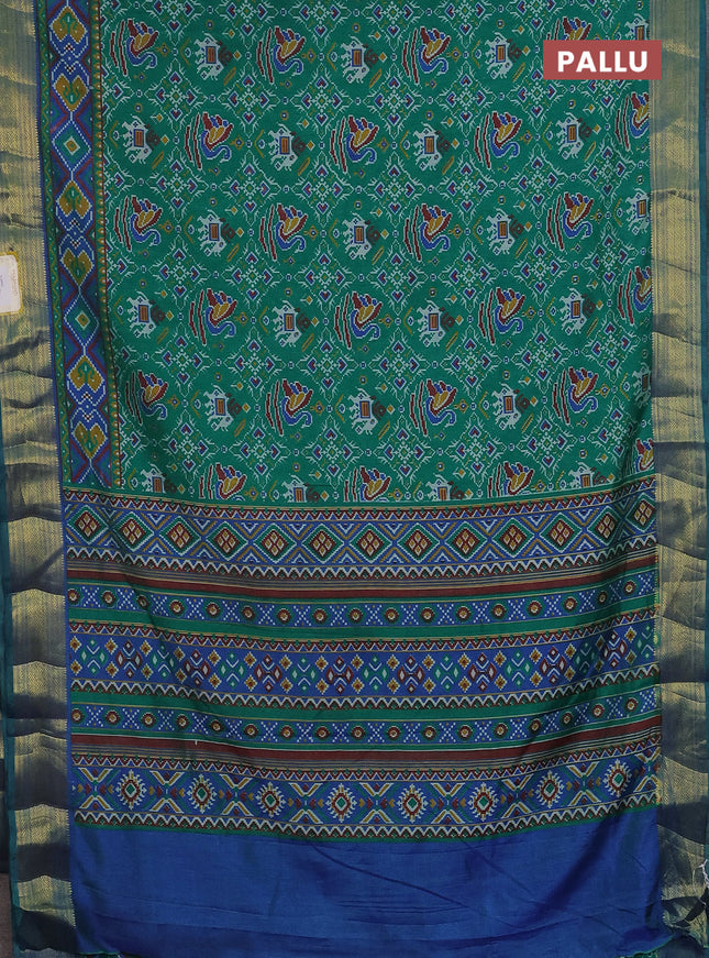 Semi tussar saree teal green and blue with allover ikat prints and zari woven border