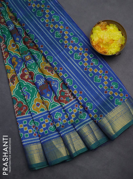 Semi tussar saree green and blue with allover ikat prints and zari woven border