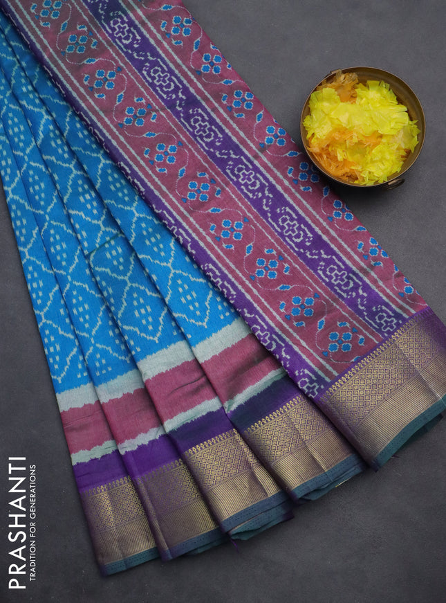 Semi tussar saree cs blue and violet with allover ikat prints and zari woven border