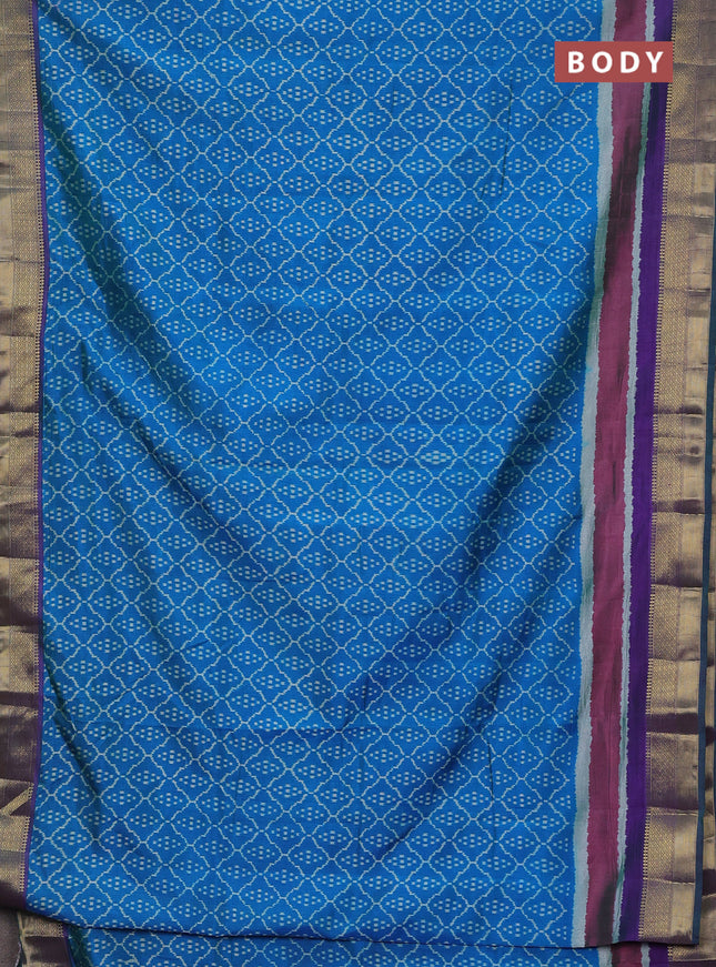 Semi tussar saree cs blue and violet with allover ikat prints and zari woven border