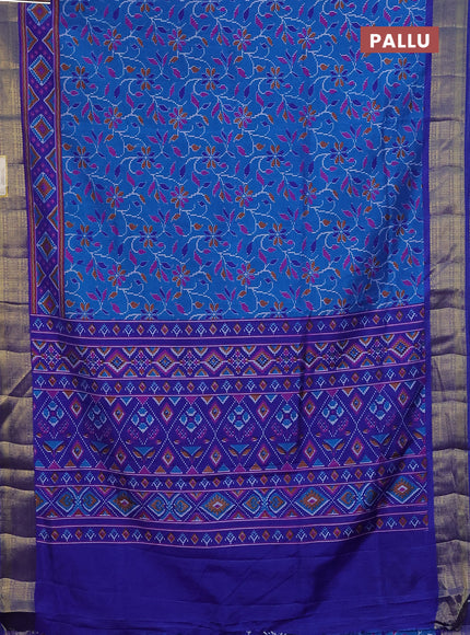 Semi tussar saree cs blue and blue with allover ikat prints and zari woven border