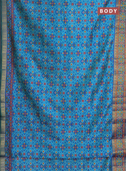 Semi tussar saree teal blue with allover ikat prints and zari woven border