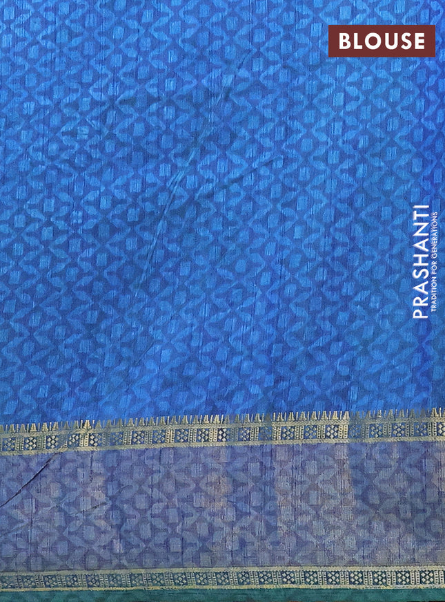 Semi tussar saree teal blue with allover ikat prints and zari woven border