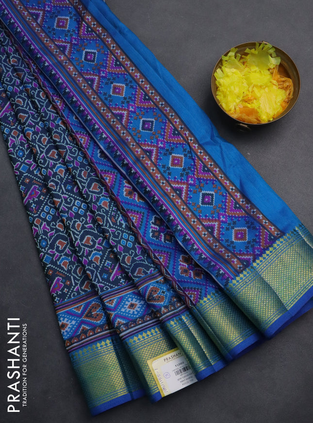 Semi tussar saree peacock blue with allover ikat prints and zari woven border