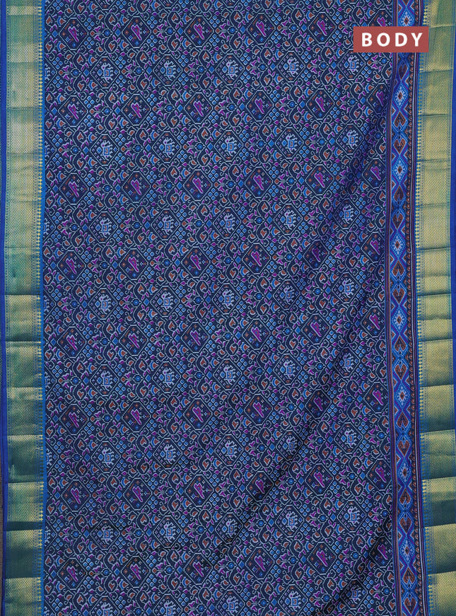 Semi tussar saree peacock blue with allover ikat prints and zari woven border