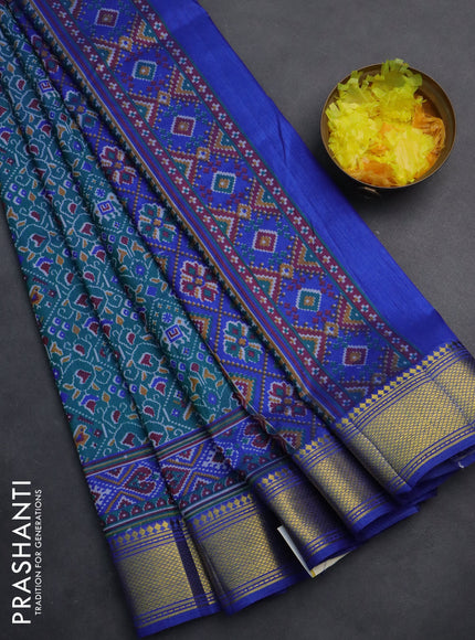 Semi tussar saree green and blue with allover ikat prints and zari woven border