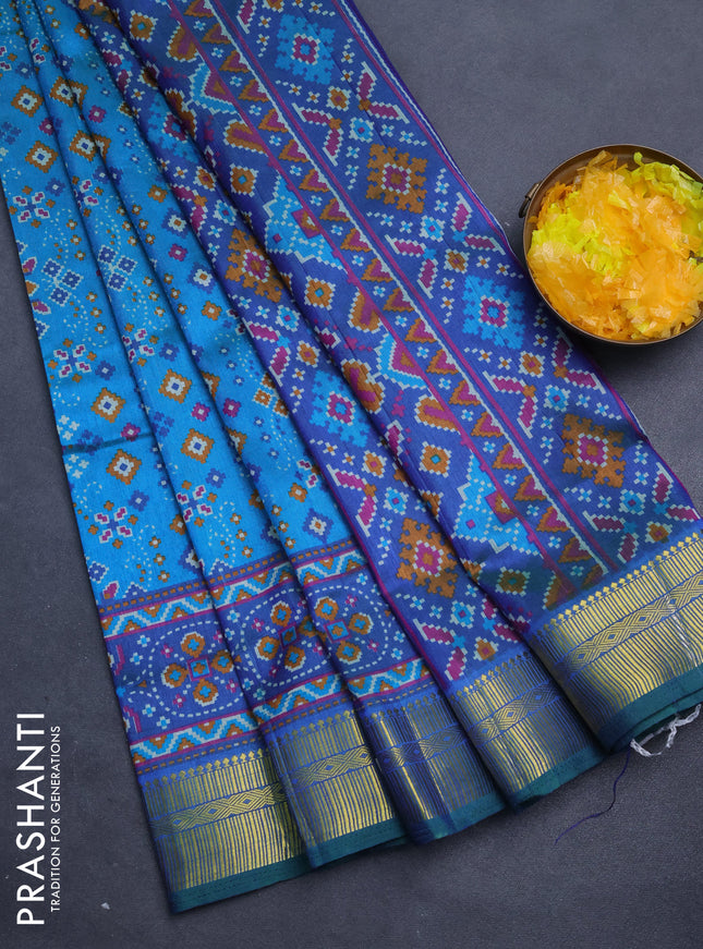 Semi tussar saree dual shade of cs blue and green with allover ikat prints and zari woven border