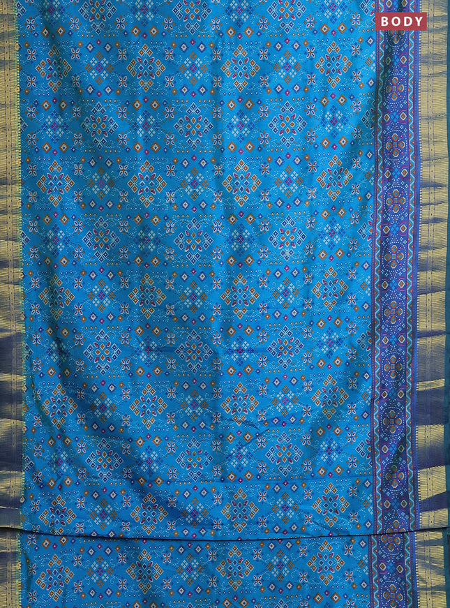 Semi tussar saree dual shade of cs blue and green with allover ikat prints and zari woven border