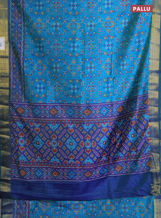 Semi tussar saree dual shade of cs blue and green with allover ikat prints and zari woven border
