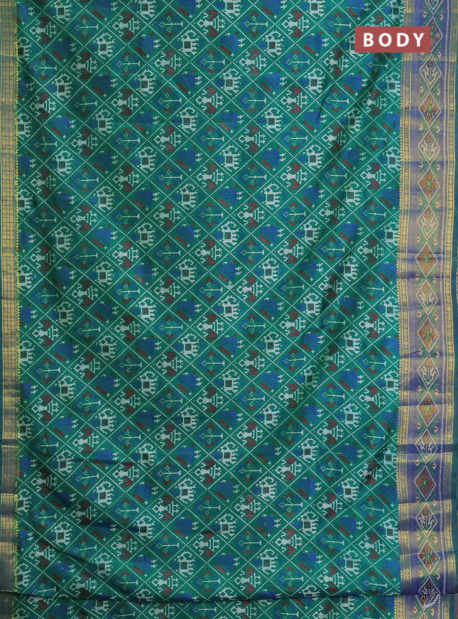 Semi tussar saree green with allover ikat prints and zari woven border